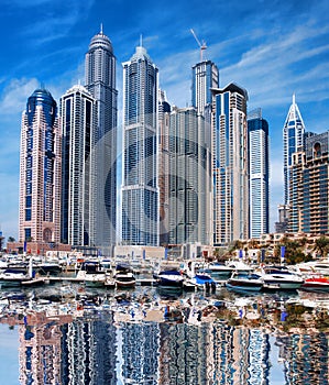 Dubai Marina with boats in Dubai, United Arab Emirates, Middle East