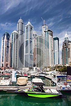 Dubai marina with boats in United Arab Emirates