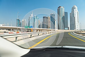 Dubai Marina buildings from moving car