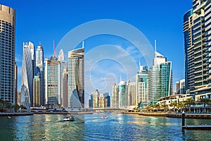 Dubai Marina canal with azure water and high rise buildings, United Arab Emirates