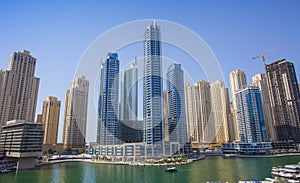 Dubai Marina city with skyscrapers and boats