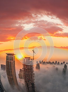 Dubai Marina with colorful sunset in Dubai, United Arab Emirates