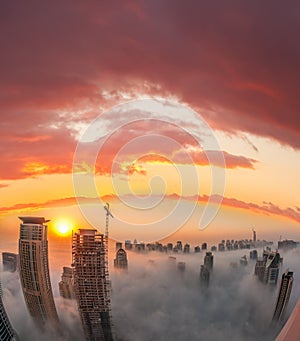 Dubai Marina with colorful sunset in Dubai, United Arab Emirates