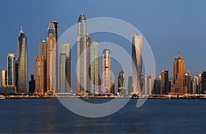 Dubai Marina at dusk as viewed from Palm Jumeirah in Dubai, UAE