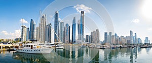 Dubai marina harbor panorama on a sunny day in the UAE