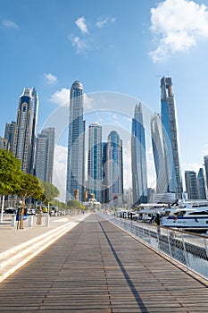 Dubai marina harbor on a sunny day in the UAE