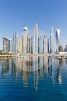 Dubai Marina and Harbour skyline architecture travel in United Arab Emirates water reflection portrait format