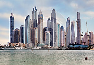 Dubai Marina and JBR area and golden sand beaches in the Persian Gulf. Holidays and vacations in the UAE