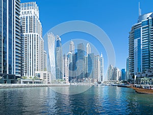 Dubai Marina and lake or river, Downtown skyline, United Arab Emirates or UAE. Financial district and business area in smart urban