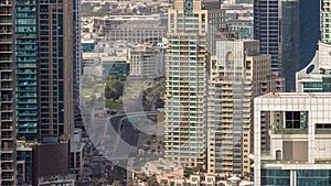 Dubai Marina and Media City districts with modern skyscrapers and office buildings aerial timelapse.