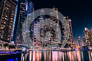 Dubai Marina with modern skyscrapers at night. Dubai, United Arab Emirates