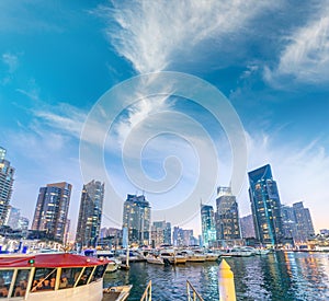 Dubai Marina panoramic skyline and buildings at sunset