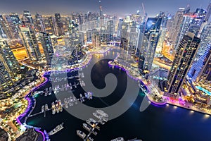 Dubai Marina skyline architecture buildings travel overview at night twilight from above in United Arab Emirates