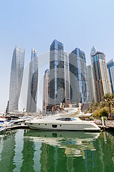 Dubai Marina skyline yacht harbor architecture travel portrait format in United Arab Emirates