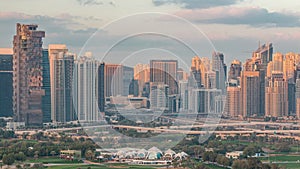 Dubai Marina skyscrapers and golf course morning timelapse, Dubai, United Arab Emirates