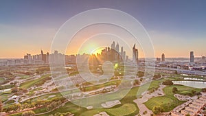 Dubai Marina skyscrapers and golf course sunset timelapse, Dubai, United Arab Emirates