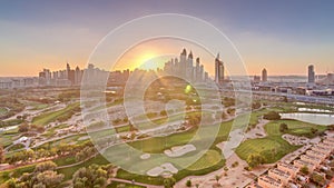 Dubai Marina skyscrapers and golf course sunset timelapse, Dubai, United Arab Emirates