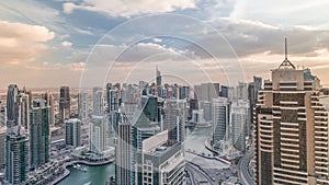 Dubai Marina skyscrapers and jumeirah lake towers view from the top aerial timelapse in the United Arab Emirates.