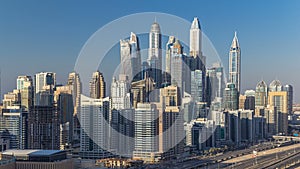 Dubai Marina towers during sunset aerial timelapse, United Arab Emirates