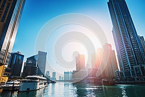 Dubai Marina water canal with high buildings and boats, United Arab Emirates