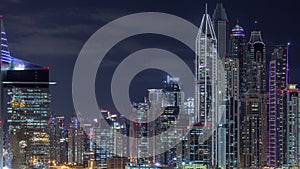 Dubai Media City with Modern buildings aerial night timelapse, United Arab Emirates