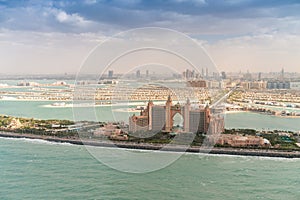 Dubai Palm Jumeirah. Aerial view with city skyline on background