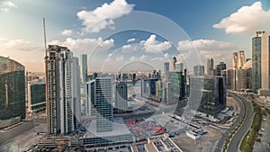 Dubai`s business bay towers at morning aerial timelapse.