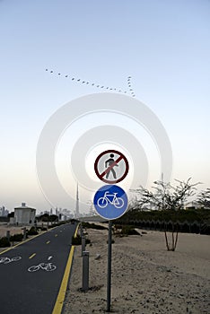 Dubai skyline from Nad Al Sheba bicycle track road, Dubai, United Arab Emirates