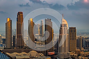 Dubai cityscape at sunset with skyscrapers, modern urban architecture, United Arab Emirates photo