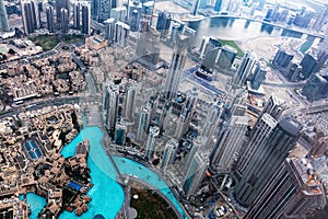 Dubai UAE aerial rooftop view from Burj Khalifa in clouds