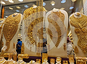 Beautiful gold jewelry made up of 24 carat pure gold. Expensive wedding necklace at a shop in Dubai Gold souk.