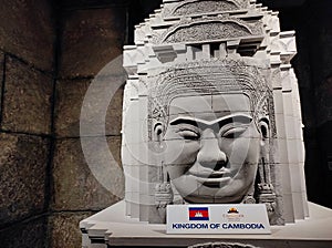 Large head sculpture of the Khmer Buddha created from grey rock. Angkor wat temple is an ancient world civilization located in Cam