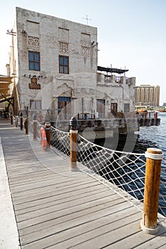 Dubai, UAE. Buildings and houses of traditional historical architecture of the old city of the Emirates in the Persian