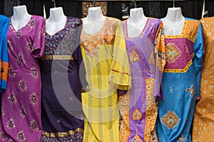 Dubai UAE Colorful women's dresses are displayed for sale at the Al Naif souq in Deira photo