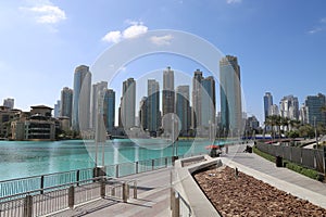 Dubai, UAE - February 14,2022: Skyline of Dubai downtown, at the Burj Khalifa. View from Dubai Fountain Boardwalk and the Dubai