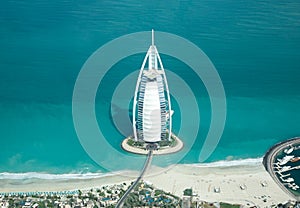 Aerial view of Burj Al Arab on a beautiful sunny day.