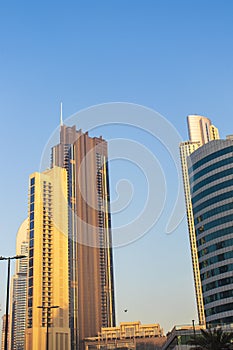 Dubai, UAE - 01.15.2021 Morning hour in Business bay district , Marasi drive. Burj Khalifa, tallest building in the world can be photo