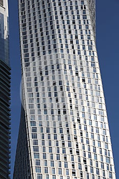 DUBAI, UAE - NOVEMBER 23, 2017: Cayan Tower building in Dubai Marina, UAE. The residential skyscraper was designed by Skidmore,