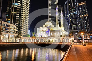 The night illumination of Dubai Marina and Muslim Mosque