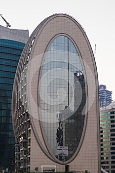 Dubai, UAE - 02.12.2021 Oval shaped of the buildings in Marasi drive, Business Bay District. Outdoors photo