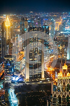 Dubai, UAE, United Arab Emirates - May 25, 2021: Aerial View Of Night Dubai Cityscape Skyline. Street Night Traffic Of