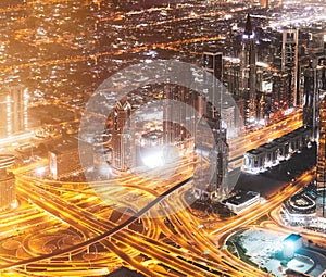 Dubai, UAE, United Arab Emirates - May 25, 2021: Aerial View Of Urban Cityscape Skyline At Night. City Background Of