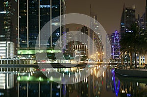 High Dubai skyscrapers of the business city centers in night