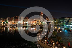 Dubai, United Arab Emirates - December 3, 2023: Charming French-Style Architecture in Dubai\'s Riverland during night