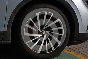 Dubai, United Arab Emirates - January 10, 2023 car wheel metal alloy rim and tire in close up, black and white