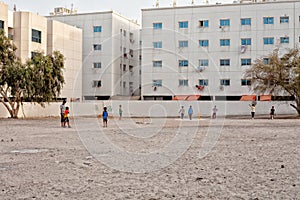 Children playing a game of cricket