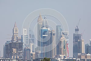 DUBAI, UNITED ARAB EMIRATES - OCTOBER, 2018: Downtown with towers paniramic view from the top in Dubai, United Arab Emirates