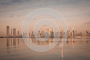 Dubai skyrise at sunrise from Dubai creek photo