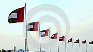 DUBAI, UNITED ARAB EMIRATES, UAE - NOVEMBER 20, 2017: flags of UAE blowing in the wind