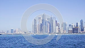 Dubai water canal, Dubai, United Arab Emirates. Stock. View of skyscrapers in Dubai from the water